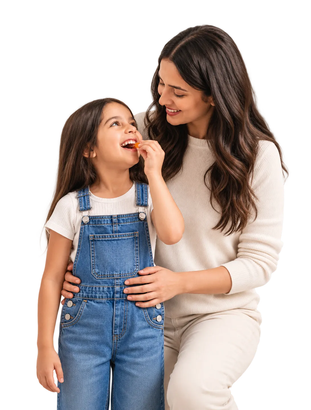 A mother holds her smiling daughter as they share a gummy